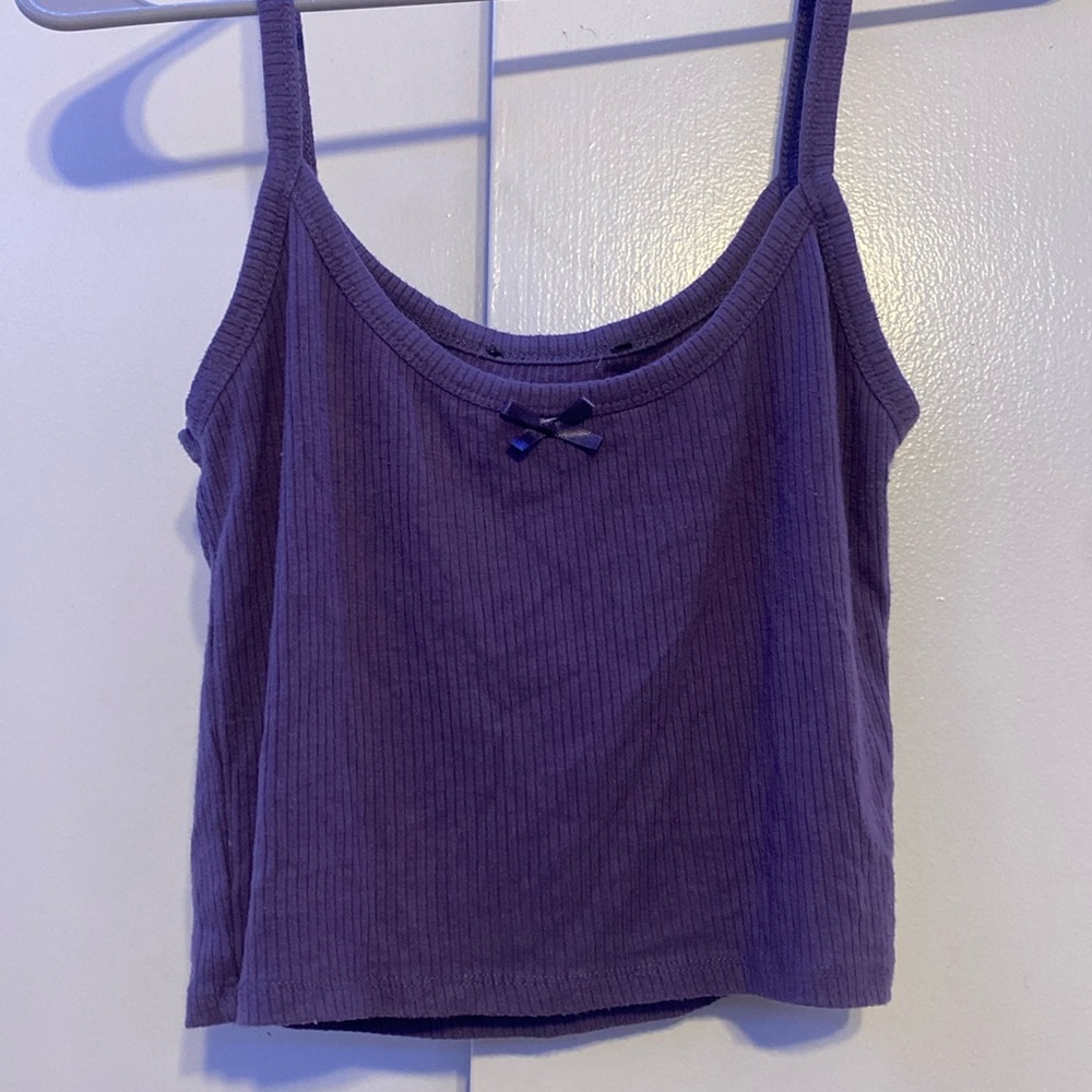 Cutesy purple tank top with bow.